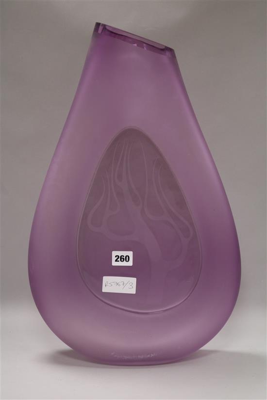 A tall modern mauve glass vase 51cm